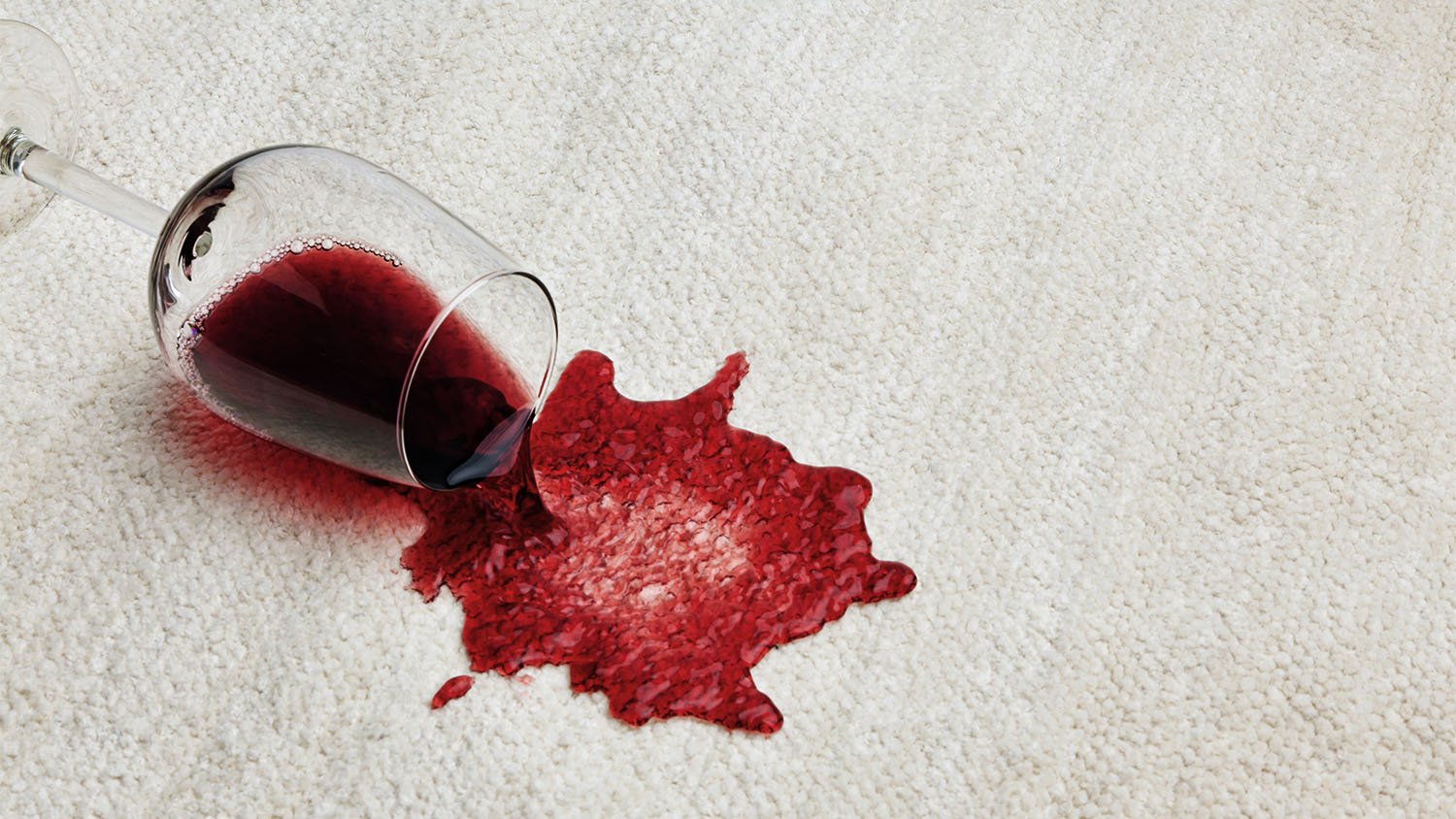 spilled red wine on light carpet